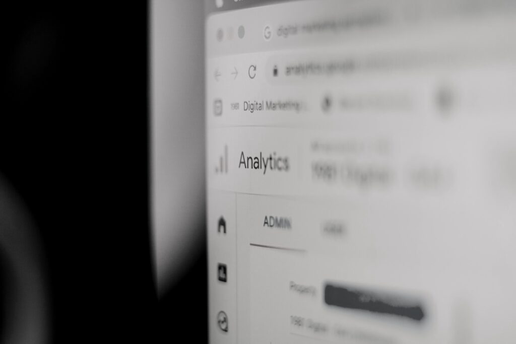 A black and white photo of a computer monitor showing Google Analytics for SEO